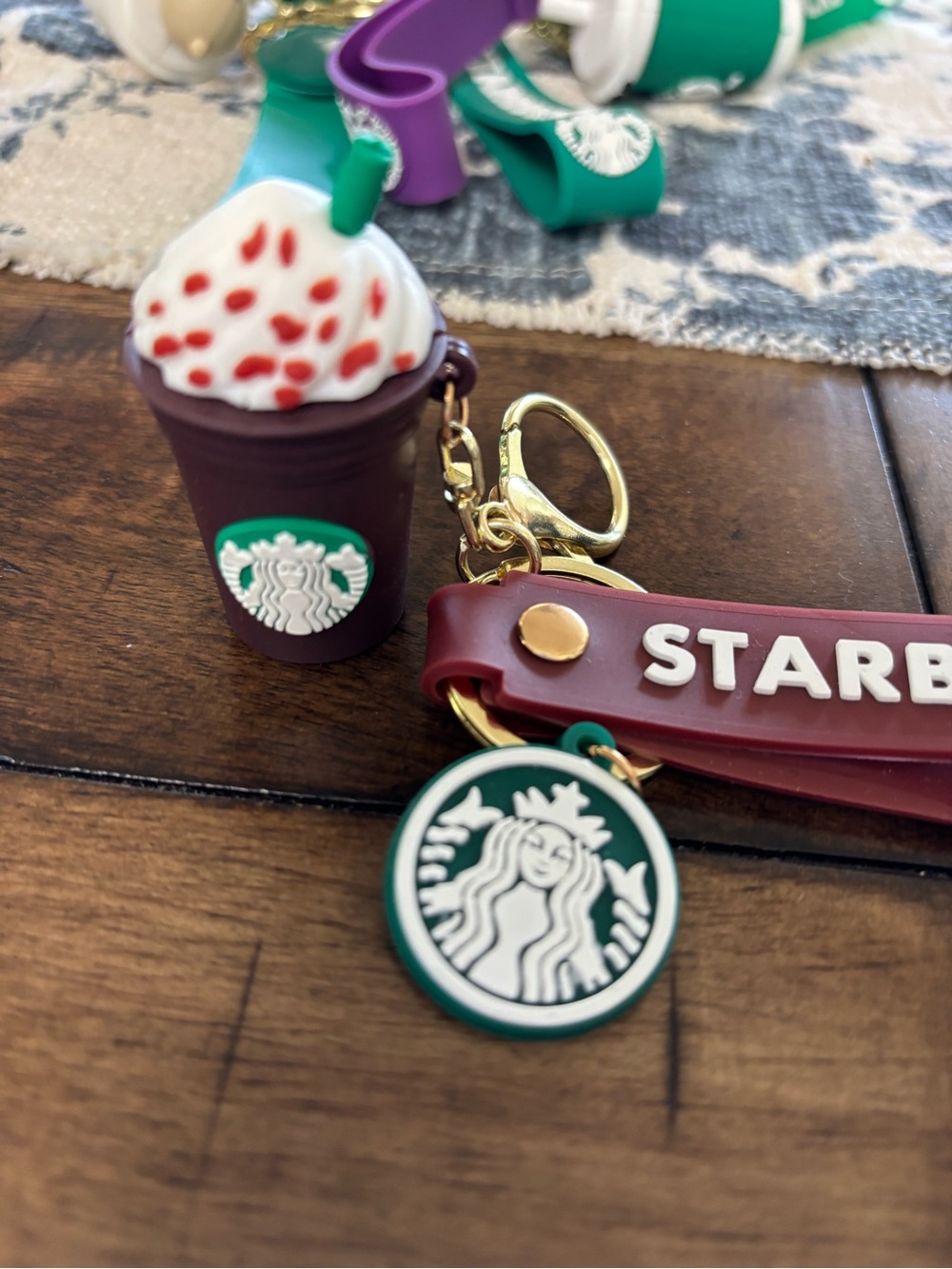 Starbucks Maroon Strap Keychain with Green Logo and White Toppings Charm